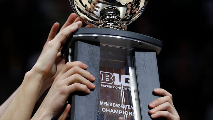 Purdue Boilermakers hold up the Big Ten Conference Champions trophy after the NCAA men   s basketball game against the Illinois Fighting Illini, Sunday, March 5, 2023, at Mackey Arena in West Lafayette, Ind. The Purdue Boilermakers won 76-71.

Purillini030523 Am8508
