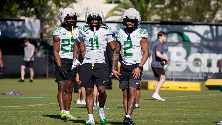 Oregon running back Jay Harris, left, wide receivers Jeremiah McClellan and Gary Bryant Jr. work out as the Oregon Ducks practice at Barry University ahead of the Orange Bowl on Dec. 30, 2025, in Miami, Florida.