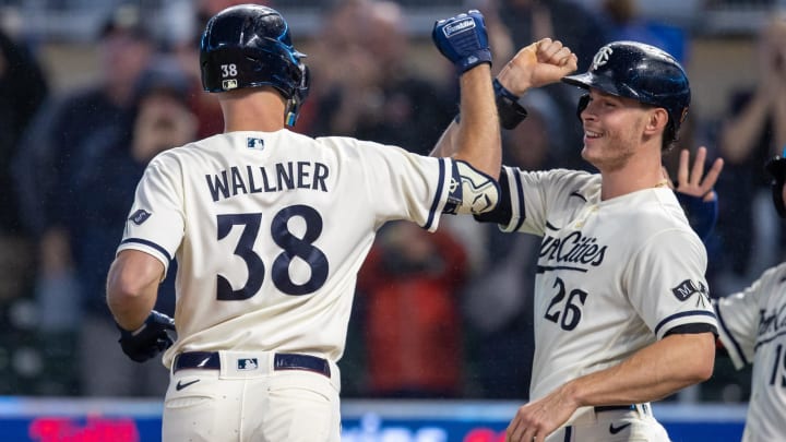 Sep 26, 2023; Minneapolis, Minnesota, USA; Minnesota Twins left fielder Matt Wallner (38) celebrates with Minnesota Twins right fielder Max Kepler (26) after hitting a grand slam against the Oakland Athletics in the first inning at Target Field. Mandatory Credit: Jesse Johnson-USA TODAY Sports