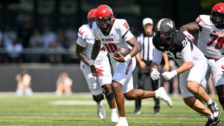 Sep 19, 2026; Nashville, Tennessee, USA; NC State Wolfpack quarterback Will Wilson (10) runs with the ball for a touchdown against the Vanderbilt Commodores during the first half at FirstBank Stadium. Mandatory Credit: Steve Roberts-Imagn Images Sep 19, 2026; Nashville, Tennessee, USA; NC State Wolfpack quarterback Will Wilson (10) runs with the ball for a touchdown against the Vanderbilt Commodores during the first half at FirstBank Stadium. Mandatory Credit: Steve Roberts-Imagn Images