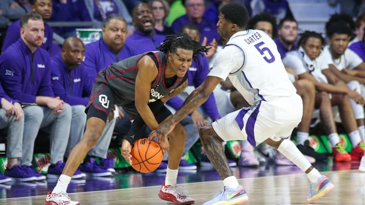 Jan 30, 2024; Manhattan, Kansas, USA; Kansas State Wildcats guard Cam Carter (5) tries to steal the ball from Oklahoma.