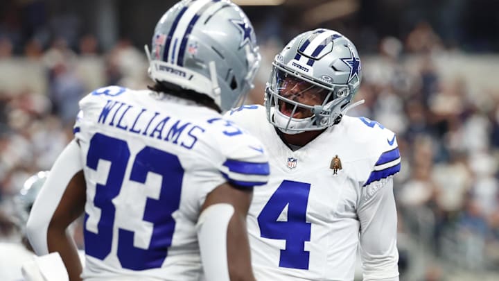 Dallas Cowboys running back Javonte Williams celebrates with Dak Prescott after a touchdown against the New York Giants 