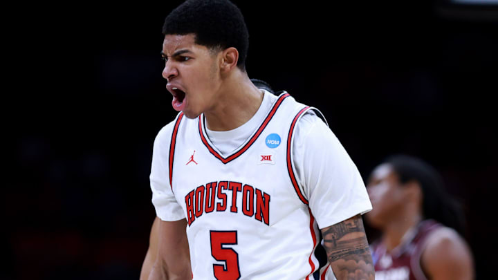 Houston's Chris Cenac Jr. cheers during a second-round game in the NCAA men's basketball tournament between Houston Cougars and Texas A&M Aggies at Paycom Center in Oklahoma City, Saturday March 21, 2026.