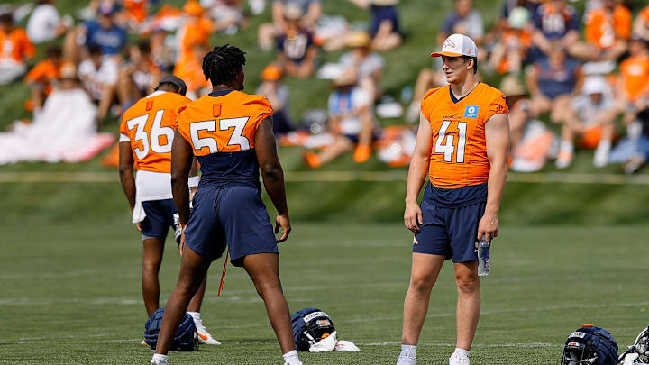 Jul 26, 2024; Englewood, CO, USA; Denver Broncos linebacker Durell Nchami (53) and linebacker Drew Sanders (41) during training camp at Broncos Park Powered by CommonSpirit. Mandatory Credit: Isaiah J. Downing-Imagn Images