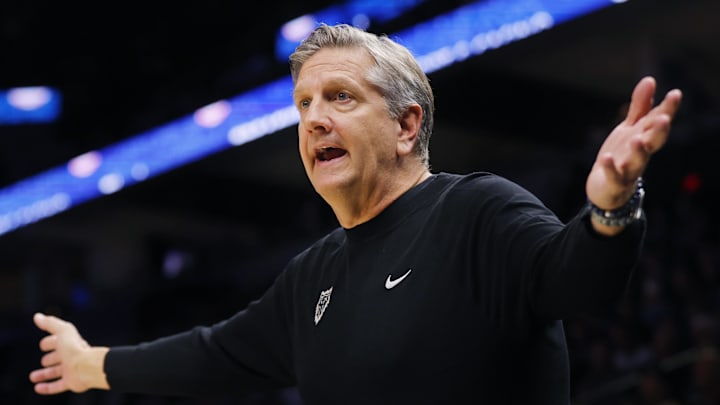 Jan 6, 2026; Minneapolis, Minnesota, USA; Minnesota Timberwolves head coach Chris Finch questions a referee during a moment in the game with the Miami Heat in the third quarter at Target Center. Mandatory Credit: Bruce Kluckhohn-Imagn Images