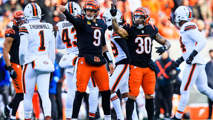 Dec 22, 2024; Cincinnati, Ohio, USA; Cincinnati Bengals quarterback Joe Burrow (9) reacts after advancing the ball with running back Chase Brown (30) in the first half against the Cleveland Browns at Paycor Stadium. Mandatory Credit: Katie Stratman-Imagn Images Dec 22, 2024; Cincinnati, Ohio, USA; Cincinnati Bengals quarterback Joe Burrow (9) reacts after advancing the ball with running back Chase Brown (30) in the first half against the Cleveland Browns at Paycor Stadium. Mandatory Credit: Katie Stratman-Imagn Images