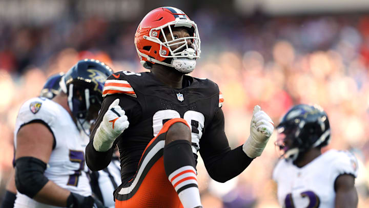 Cleveland Browns defensive end Za'Darius Smith (99) celebrates after sacking Baltimore Ravens quarterback Lamar Jackson (8) during the second half of an NFL football game at Huntington Bank Field,