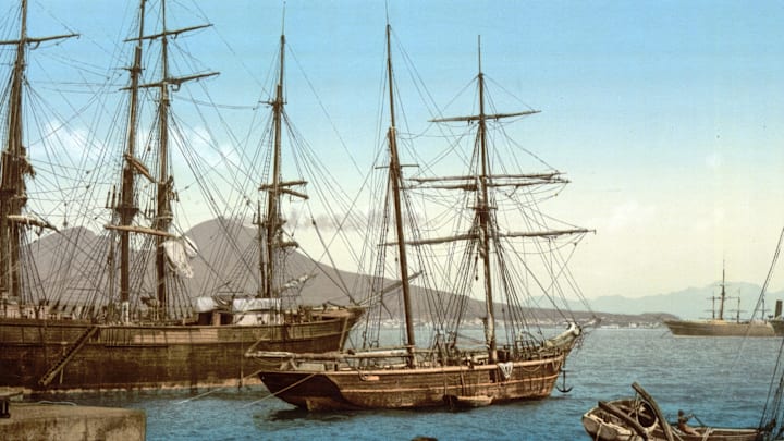 Drawing of ships in a harbor by mountains Drawing of ships in a harbor by mountains