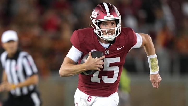 Sep 13, 2025; Stanford, California, USA; Stanford Cardinal quarterback Ben Gulbranson (15) carries the ball against the Boston College Eagles during the first quarter at Stanford Stadium. Mandatory Credit: Darren Yamashita-Imagn Images Sep 13, 2025; Stanford, California, USA; Stanford Cardinal quarterback Ben Gulbranson (15) carries the ball against the Boston College Eagles during the first quarter at Stanford Stadium. Mandatory Credit: Darren Yamashita-Imagn Images