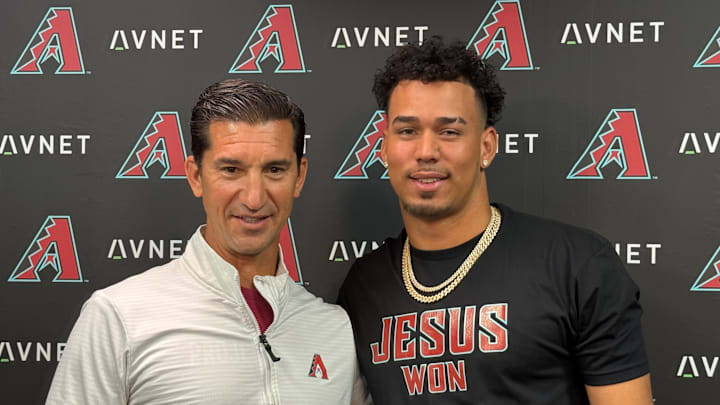 Arizona Diamondbacks Vice President and General Manager Mike Hazen and pitcher Justin Martinez during press conference  at Chase Field to announced contract extension March 24, 2025