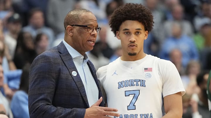 Feb 26, 2024; Chapel Hill, North Carolina, USA; North Carolina Tar Heels head coach Hubert Davis with guard Seth Trimble (7) in the second half at Dean E. Smith Center. Mandatory Credit: Bob Donnan-Imagn Images