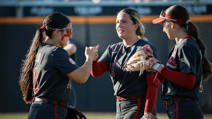 Alabama softball players before Monday night's game at Tennessee
