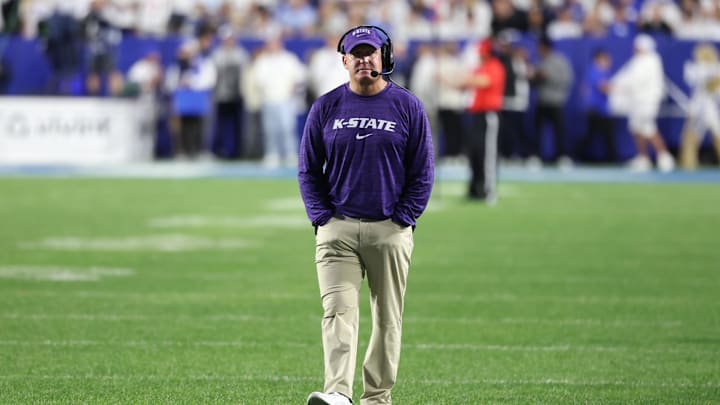Sep 21, 2024; Provo, Utah, USA; Kansas State Wildcats head coach Chris Klieman looks on during the third quarter against the Brigham Young Cougars at LaVell Edwards Stadium. Mandatory Credit: Rob Gray-Imagn Images Sep 21, 2024; Provo, Utah, USA; Kansas State Wildcats head coach Chris Klieman looks on during the third quarter against the Brigham Young Cougars at LaVell Edwards Stadium. Mandatory Credit: Rob Gray-Imagn Images