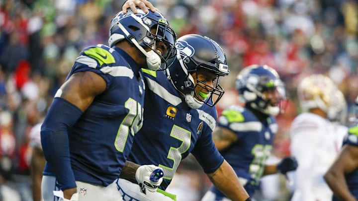 Then Seattle Seahawks quarterback Russell Wilson (3) celebrates with wide receiver DK Metcalf (14) after throwing a touchdown pass against the San Francisco 49ers.