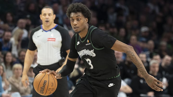 Mar 20, 2026; Minneapolis, Minnesota, USA; Minnesota Timberwolves forward Jaden McDaniels (3) dribbles the ball against the Portland Trail Blazers in the second half at Target Center. Mandatory Credit: Jesse Johnson-Imagn Images
