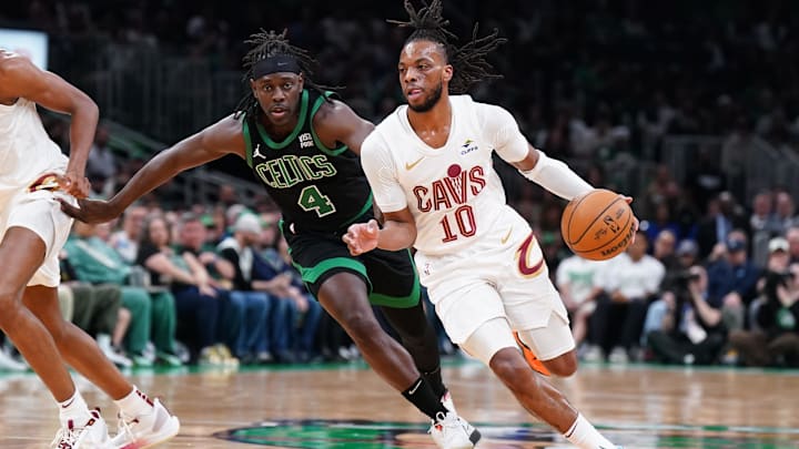 May 15, 2024; Boston, Massachusetts, USA; Cleveland Cavaliers guard Darius Garland (10) drives the ball against Boston Celtics guard Jrue Holiday (4) in the first quarter during game five of the second round for the 2024 NBA playoffs at TD Garden. Mandatory Credit: David Butler II-Imagn Images