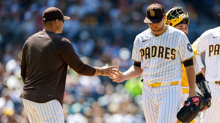 Jun 10, 2026; San Diego, California, USA; San Diego Padres manager Craig Stammen (14) takes the ball from starting pitcher Michael King (34) during the seventh inning against the Cincinnati Reds at Petco Park. Mandatory Credit: David Frerker-Imagn Images Jun 10, 2026; San Diego, California, USA; San Diego Padres manager Craig Stammen (14) takes the ball from starting pitcher Michael King (34) during the seventh inning against the Cincinnati Reds at Petco Park. Mandatory Credit: David Frerker-Imagn Images