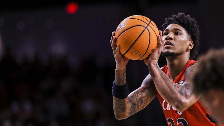Mar 5, 2025; Cincinnati, Ohio, USA; Cincinnati Bearcats forward Dillon Mitchell (23) shoots a free throw against the Kansas State Wildcats in the first half at Fifth Third Arena. Mandatory Credit: Katie Stratman-Imagn Images Mar 5, 2025; Cincinnati, Ohio, USA; Cincinnati Bearcats forward Dillon Mitchell (23) shoots a free throw against the Kansas State Wildcats in the first half at Fifth Third Arena. Mandatory Credit: Katie Stratman-Imagn Images
