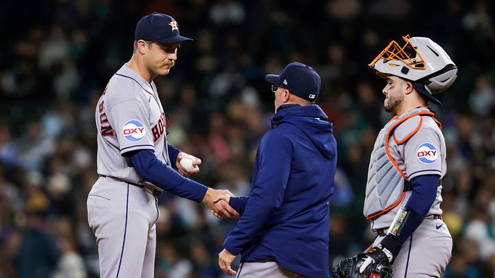 Sep 23, 2026; Seattle, Washington, USA; Houston Astros relief pitcher Josh Hendrickson (61) shakes hands with manager Joe Espada (21) during a fifth inning pitching change against the Seattle Mariners at T-Mobile Park. Mandatory Credit: Joe Nicholson-Imagn Images Sep 23, 2026; Seattle, Washington, USA; Houston Astros relief pitcher Josh Hendrickson (61) shakes hands with manager Joe Espada (21) during a fifth inning pitching change against the Seattle Mariners at T-Mobile Park. Mandatory Credit: Joe Nicholson-Imagn Images