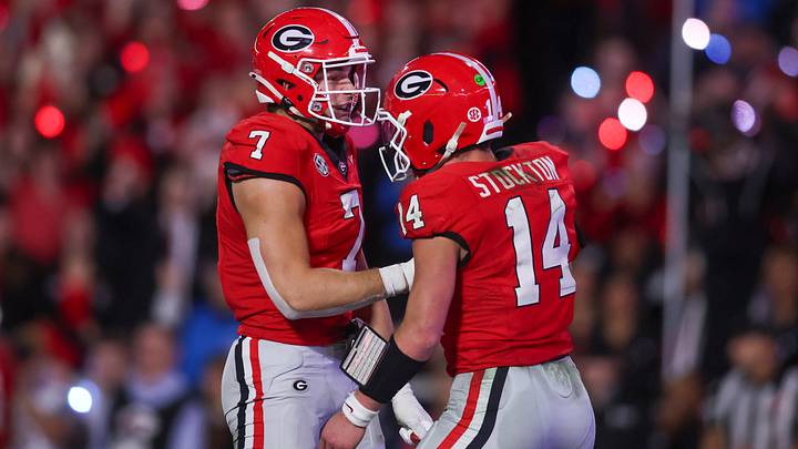 Nov 15, 2025; Athens, Georgia, USA; Georgia Bulldogs tight end Lawson Luckie (7) and quarterback Gunner Stockton (14) celebrate in the second half against the Texas Longhorns at Sanford Stadium. Mandatory Credit: Brett Davis-Imagn Images