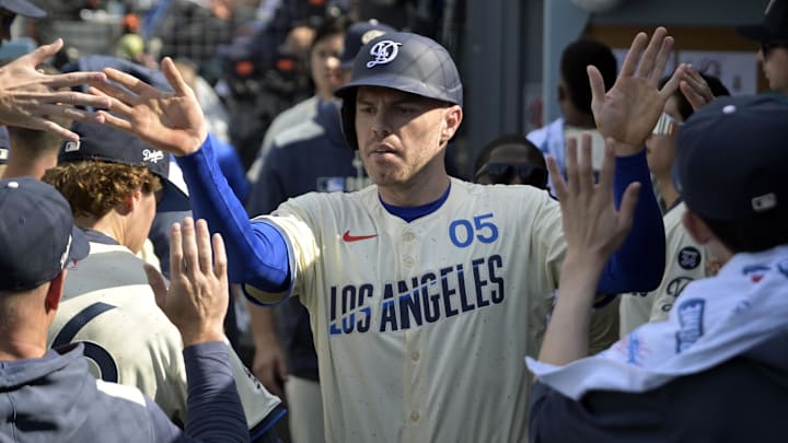 May 31, 2025; Los Angeles, California, USA;  Los Angeles Dodgers first baseman Freddie Freeman (5) celebrates after scoring in the first inning against the New York Yankees at Dodger Stadium. Mandatory Credit: Jayne Kamin-Oncea-Imagn Images