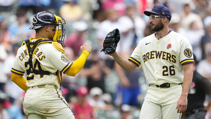 May 25, 2026; Milwaukee, Wisconsin, USA;  Milwaukee Brewers catcher William Contreras (24) greets pitcher Aaron Ashby (26) following the game against the St. Louis Cardinals at American Family Field. Mandatory Credit: Jeff Hanisch-Imagn Images