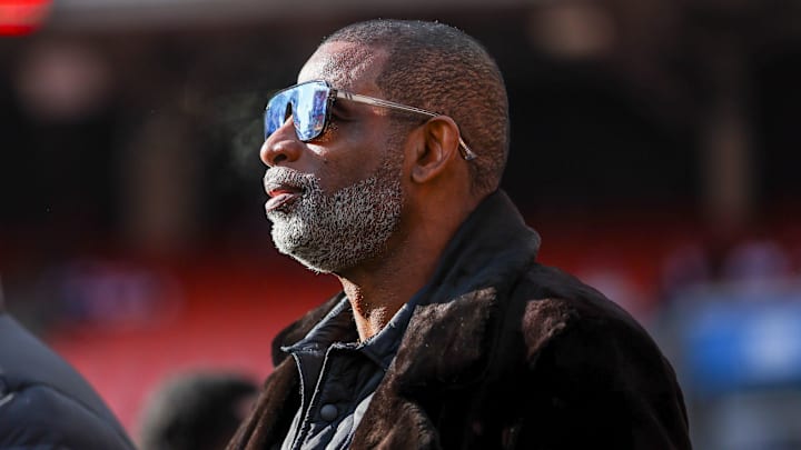 Dec 21, 2025; Cleveland, Ohio, USA;  Legendary  football and baseball player and father of Cleveland Browns quarterback Shedeur Sanders, Deion Sanders on the sidelines prior to a game against the Buffalo Bills at Huntington Bank Field. Credit: Scott Galvin-Imagn Images
