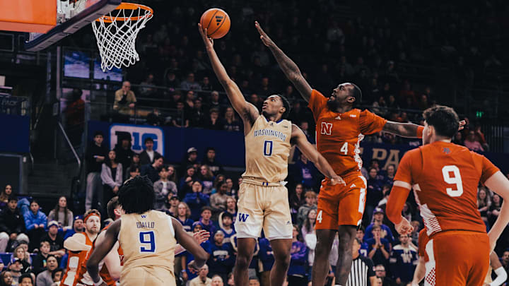 Mekhi Mason (0) drives to the basket against Nebraska. 