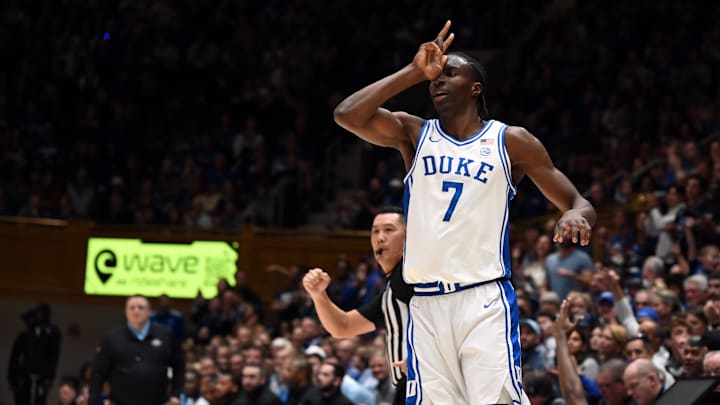 Nov 14, 2025; Durham, North Carolina, USA; Duke Blue Devils forward Dame Sarr (7) reacts after hitting a three-pointer during the second half against the Indiana State Sycamores at Cameron Indoor Stadium. Mandatory Credit: Rob Kinnan-Imagn Images