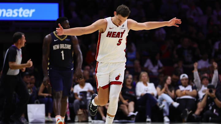 Oct 13, 2024; Miami, Florida, USA; Miami Heat forward Nikola Jovic (5) reacts after scoring against the New Orleans Pelicans during the second quarter at Kaseya Center. Mandatory Credit: Sam Navarro-Imagn Images