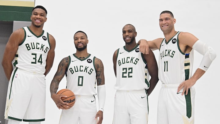 Oct 2, 2023; Milwaukee, WI, USA; Milwaukee Bucks forward Giannis Antetokounmpo (34), guard Damian Lillard (0), forward Khris Middleton (22), and center Brook Lopez (11) pose for a picture during media day in Milwaukee. Mandatory Credit: Benny Sieu-Imagn Images Oct 2, 2023; Milwaukee, WI, USA; Milwaukee Bucks forward Giannis Antetokounmpo (34), guard Damian Lillard (0), forward Khris Middleton (22), and center Brook Lopez (11) pose for a picture during media day in Milwaukee. Mandatory Credit: Benny Sieu-Imagn Images