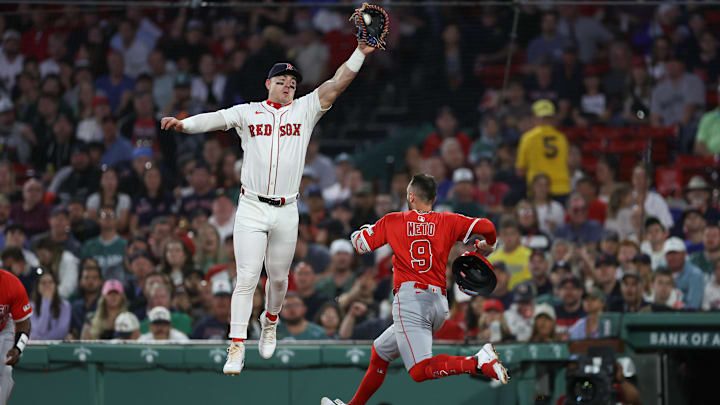 Jun 3, 2025; Boston, Massachusetts, USA; Los Angeles Angels shortstop Zachary Neto (9) beats a throw to Boston Red Sox first baseman Romy Gonzalez (23) during the fifth inning at Fenway Park. Mandatory Credit: Paul Rutherford-Imagn Images Jun 3, 2025; Boston, Massachusetts, USA; Los Angeles Angels shortstop Zachary Neto (9) beats a throw to Boston Red Sox first baseman Romy Gonzalez (23) during the fifth inning at Fenway Park. Mandatory Credit: Paul Rutherford-Imagn Images