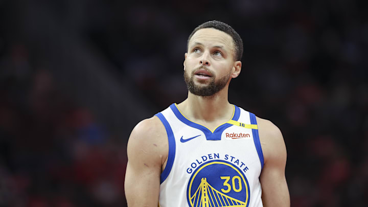 Dec 11, 2024; Houston, Texas, USA; Golden State Warriors guard Stephen Curry (30) looks up after a play during the fourth quarter against the Houston Rockets at Toyota Center. 