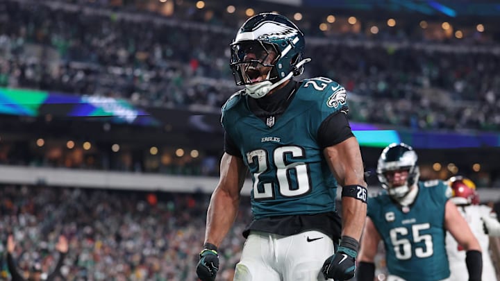 Jan 26, 2025; Philadelphia, PA, USA; Philadelphia Eagles running back Saquon Barkley (26) celebrates after a touchdown against the Washington Commanders during the second half in the NFC Championship game at Lincoln Financial Field. Mandatory Credit: Bill Streicher-Imagn Images