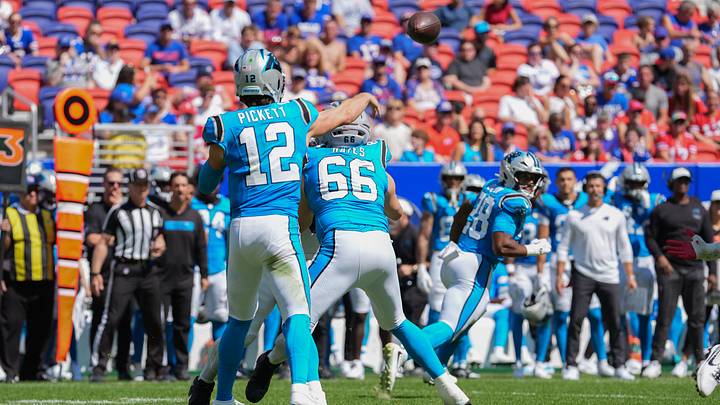 Carolina Panthers quarterback Kenny Pickett (12) throws the ball against the Buffalo Bills 
