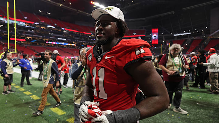 Dec 7, 2024; Atlanta, GA, USA; Georgia Bulldogs linebacker Jalon Walker (11) reacts after defeating the Texas Longhorns in overtime in the 2024 SEC Championship game at Mercedes-Benz Stadium. Mandatory Credit: Brett Davis-Imagn Images
