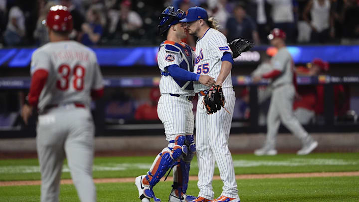 Aug 25, 2025; New York City, New York, USA; New York Mets catcher Luis Torrens (13) and New York Mets pitcher Ryne Stanek (55) celebrate the victory against the Philadelphia Phillies after the ninth inning at Citi Field. Mandatory Credit: Gregory Fisher-Imagn Images