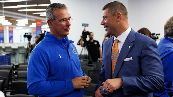 Former Florida Gators head coach Urban Meyer helped the program in its hiring of Jon Sumrall as the next head coach. Former Florida Gators head coach Urban Meyer helped the program in its hiring of Jon Sumrall as the next head coach.