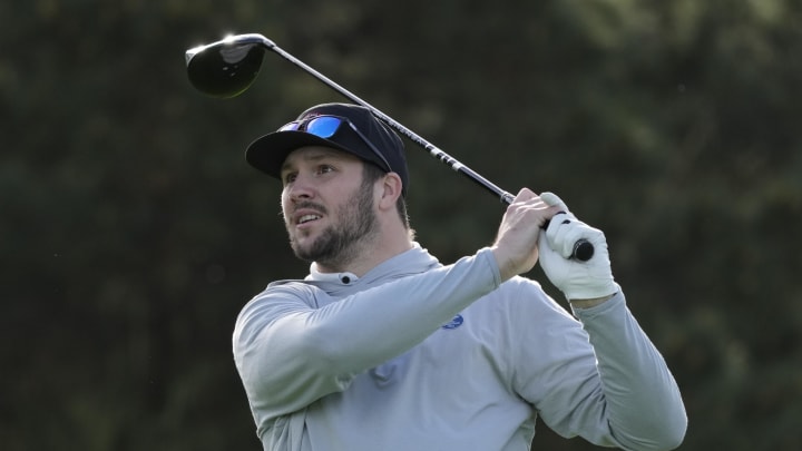 Feb 1, 2024; Pebble Beach, CA; Buffalo Bills quarterback Josh Allen hits his tee shot on the 11th hole during the first round of the Pebble Beach Pro-Am golf tournament at Spyglass Hill Golf Course.