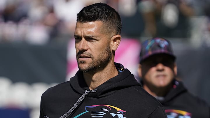Oct 6, 2024; Chicago, Illinois, USA; Carolina Panthers head coach Dave Canales takes the field against the Chicago Bears at Soldier Field. Mandatory Credit: David Banks-Imagn Images