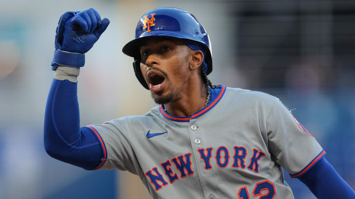New York Mets shortstop Francisco Lindor (12) reacts from first base after hitting a single against the Miami Marlins during the eighth inning at loanDepot Park. 