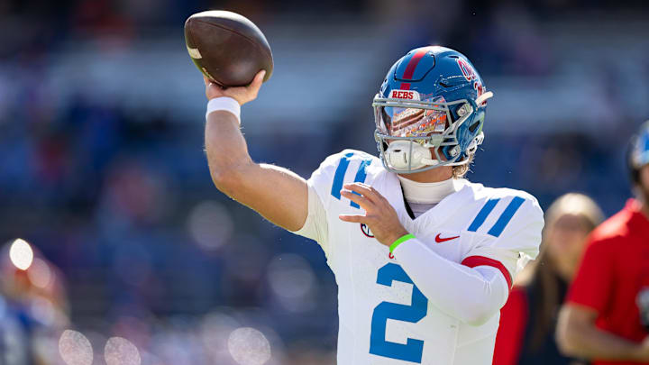 Nov 23, 2024; Gainesville, Florida, USA; Mississippi Rebels quarterback Jaxson Dart (2) warms up before a game against the Florida Gators at Ben Hill Griffin Stadium. Mandatory Credit: Matt Pendleton-Imagn Images