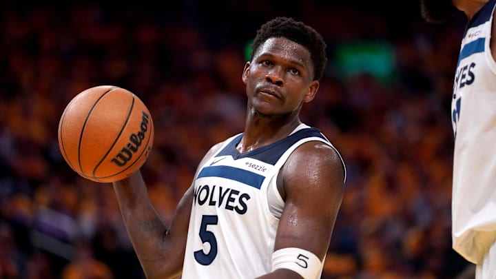 May 12, 2025; San Francisco, California, USA; Minnesota Timberwolves guard Anthony Edwards (5) holds onto the ball after being called for a foul against the Golden State Warriors in the third quarter during game four of the second round for the 2025 NBA Playoffs at Chase Center. Mandatory Credit: Cary Edmondson-Imagn Images
