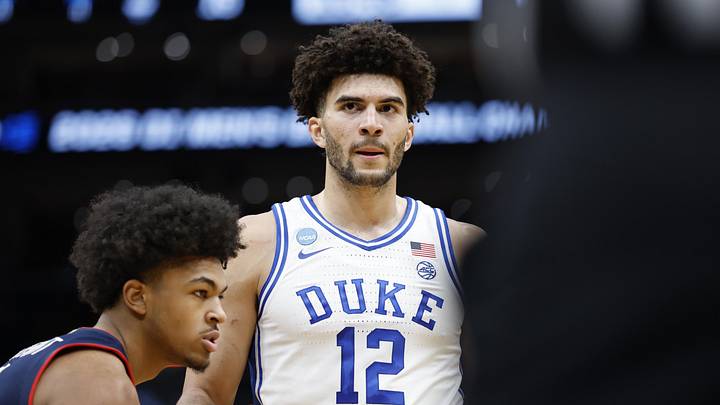 Mar 29, 2026; Washington, DC, USA; Duke Blue Devils forward Cameron Boozer (12) waits for the ball to be thrown into play as UConn Huskies forward Jaylin Stewart (3) defends in the first half during an Elite Eight game of the East Regional of the men's 2026 NCAA Tournament at Capital One Arena. Mandatory Credit: Amber Searls-Imagn Images Mar 29, 2026; Washington, DC, USA; Duke Blue Devils forward Cameron Boozer (12) waits for the ball to be thrown into play as UConn Huskies forward Jaylin Stewart (3) defends in the first half during an Elite Eight game of the East Regional of the men's 2026 NCAA Tournament at Capital One Arena. Mandatory Credit: Amber Searls-Imagn Images