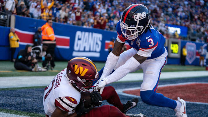 Washington Commanders wide receiver Terry McLaurin (17) catches a pass for a touchdown while being guarded by New York Giants cornerback Deonte Banks (3) during a game between the New York Giants and the Washington Commanders at MetLife Stadium in East Rutherford on Sunday, Nov. 3, 2024.