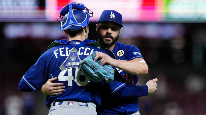 Sep 15, 2026; Cincinnati, Ohio, USA; Los Angeles Dodgers pitcher Tanner Scott hugs catcher Hunter Feduccia after defeating the Cincinnati Reds at Great American Ball Park. Mandatory Credit: Aaron Doster-Imagn Images Sep 15, 2026; Cincinnati, Ohio, USA; Los Angeles Dodgers pitcher Tanner Scott hugs catcher Hunter Feduccia after defeating the Cincinnati Reds at Great American Ball Park. Mandatory Credit: Aaron Doster-Imagn Images