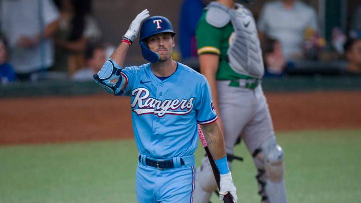Sep 10, 2023; Arlington, Texas, USA; Texas Rangers left fielder Evan Carter (32) reacts to striking out against the Oakland Athletics at Globe Life Field. Mandatory Credit: Jerome Miron-USA TODAY Sports Sep 10, 2023; Arlington, Texas, USA; Texas Rangers left fielder Evan Carter (32) reacts to striking out against the Oakland Athletics at Globe Life Field. Mandatory Credit: Jerome Miron-USA TODAY Sports