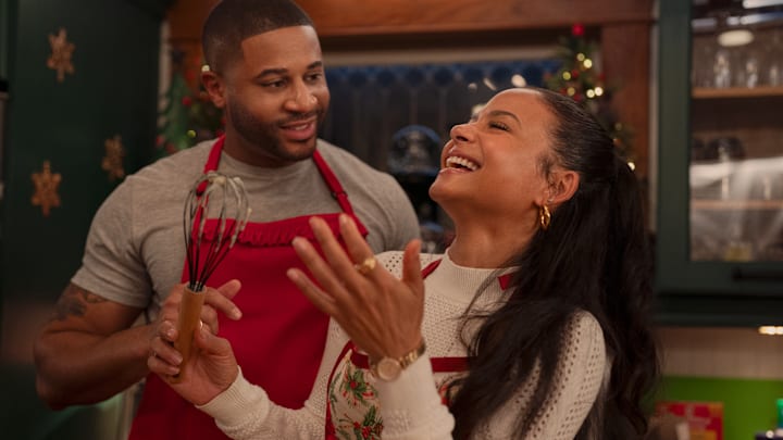 Meet Me Next Christmas. (L to R) Devale Ellis as Teddy and Christina Milian as Layla in Meet Me Next Christmas. Cr. Marni Grossman/Netflix © 2024.