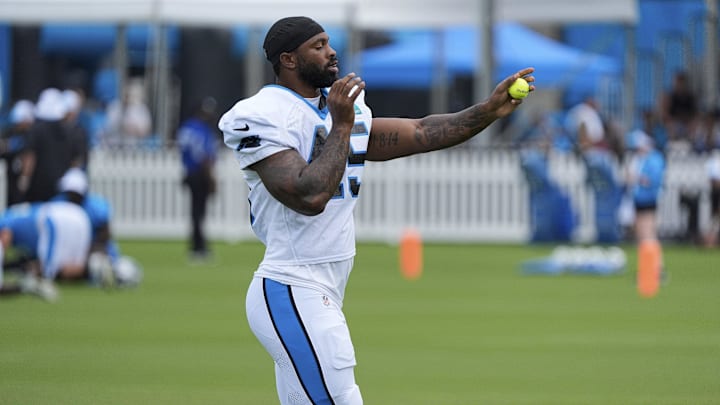 Jul 30, 2024; Charlotte, NC, USA; Carolina Panthers linebacker K'Lavon Chaisson (45) works with a tennis ball at Carolina Panthers Practice Fields.