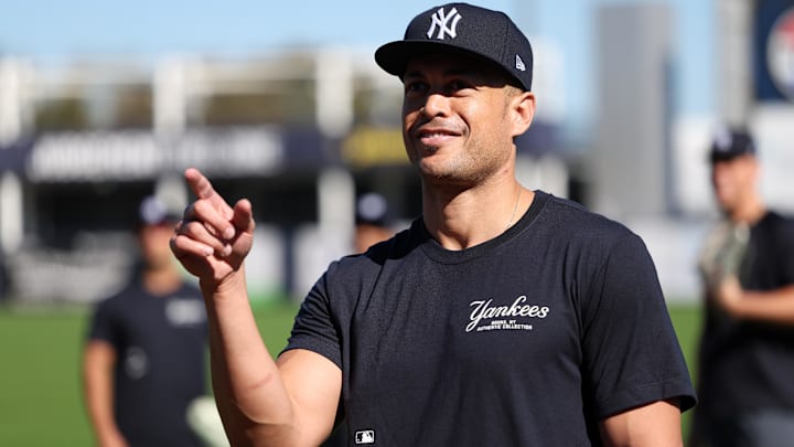 Feb 19, 2024; Tampa, FL, USA;  New York Yankees outfielder Giancarlo Stanton (27) participates in